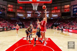 Nebraska Cornhusker center Alexis Markowski (40) puts up a lay up against Michigan Wolverine forward Whitney Sollom (25) in the first half during a college basketball game on Wednesday, January 17, 2024, in Lincoln, Nebraska. Photo by John S. Peterson.