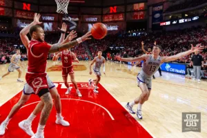 Nebraska Cornhusker guard C.J. Wilcher (0) makes a pass against the Northwestern Wildcats in the first half during a college basketball game on Saturday, January 20, 2024, in Lincoln, Nebraska. Photo by John S. Peterson.