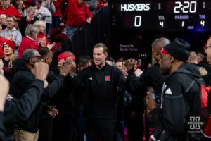 Nebraska Cornhusker head coach Fred Hoiberg receiving high fives as he makes his way to the court against the Northwestern Wildcats during a college basketball game on Saturday, January 20, 2024, in Lincoln, Nebraska. Photo by John S. Peterson.