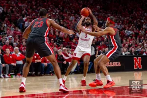 Nebraska Cornhusker guard Brice Williams (3) makes a jump shot against  during a college basketball game on Tuesday, January 23, 2024, in Lincoln, Nebraska. Photo by John S. Peterson.