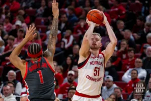 Nebraska Cornhusker forward Rienk Mast (51) makes a three point shot against Ohio State Buckeye guard Roddy Gayle Jr. (1) in the second half during a college basketball game on Tuesday, January 23, 2024, in Lincoln, Nebraska. Photo by John S. Peterson.