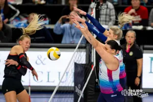 Omaha Supernovas Tori Dixon (6) and Jess Schaben-Lansman (10) block a spike from the Atlanta Vibe during the first professional volleyball match in the United States on Wednesday, January 24, 2024, in Omaha, Nebraska. Photo by John S. Peterson.