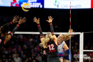 Omaha Supernovas Brooke Nuneviller (5) spikes the ball against the Atlanta Vibe in the first set during the first professional volleyball match in the United States on Wednesday, January 24, 2024, in Omaha, Nebraska. Photo by John S. Peterson.