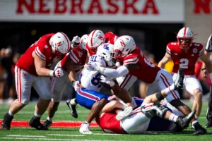 Nebraska Cornhuskers Nash Hutmacher (0), Chief Borders (14)***Nebraska Cornhuskers Rahmir Johnson (14), Nebraska Cornhuskers Nick Henrich (3) tackle Louisiana Tech Dakota Williams (81) during a college football game in Lincoln, Nebraska, Saturday, September 23, 2023. Photo by John Peterson.