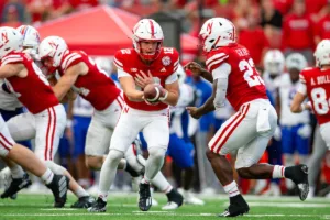 Nebraska Cornhuskers Chubba Purdy (12) hands the ball off to Anthony Grant (23) against Louisiana Tech in the fourth quarter during a college football game in Lincoln, Nebraska, Saturday, September 23, 2023. Photo by John Peterson.