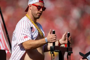 Former Nebraska Cornhuskers Will Compton readies to push the trigger on the double barrel t-shirt canon during a college football game in Lincoln, Nebraska, Saturday, September 30, 2023. Photo by John Peterson.