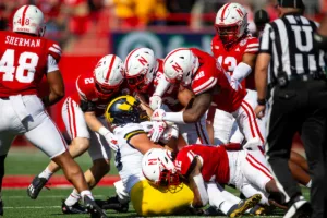 Nebraska Cornhuskers make a stop against the Michigan Wolverines during a college football game in Lincoln, Nebraska, Saturday, September 30, 2023. Photo by John Peterson.