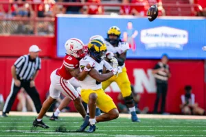 Nebraska Cornhuskers Malcolm Hartzog (13) breaks up a pass against Michigan Wolverines wide receiver Darrius Clemons (0) in the third quarter during a college football game in Lincoln, Nebraska, Saturday, September 30, 2023. Photo by John Peterson.
