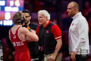 Nebraska Cornhusker head coach Mark Manning talking to Jacob Van Dee against Wyoming Cowboys during a college wrestling match on Saturday, January 6, 2024, in Lincoln, Nebraska. Photo by John S. Peterson.
