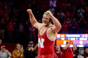 Nebraska Cornhusker Nash Hutmacher celebrates a pin for the win over Wyoming Cowboys during a college wrestling match on Saturday, January 6, 2024, in Lincoln, Nebraska. Photo by John S. Peterson.