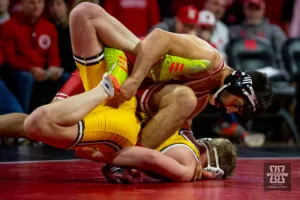 Nebraska Cornhusker Silas Allred has Wyoming Cowboy Joey Novak in a hold during a college wrestling match on Saturday, January 6, 2024, in Lincoln, Nebraska. Photo by John S. Peterson.