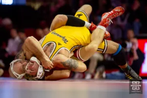 Nebraska Cornhusker Peyton Robb has Wyoming Cowboy Cooper Voorhees in a hold during a college wrestling match on Saturday, January 6, 2024, in Lincoln, Nebraska. Photo by John S. Peterson.