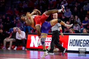 Nebraska Antrell Taylor gets thrown by Northern Iowa RJ Weston during a college wrestling match on Saturday, January 6, 2024, in Lincoln, Nebraska. Photo by John S. Peterson.