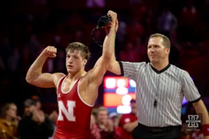 Nebraska Cornhusker Bubbba Wilson celebrates his decsion over Northern Iowa Panther Jared Simma during a college wrestling match on Saturday, January 6, 2024, in Lincoln, Nebraska. Photo by John S. Peterson.