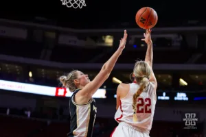Nebraska Cornhusker forward Natalie Potts (22) makes a lay up against Purdue Boilermaker guard McKenna Layden (11) in the second half during a college basketball game on Wednesday, January 31, 2024, in Lincoln, Nebraska. Photo by John S. Peterson.