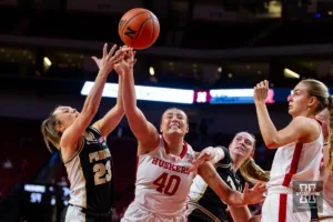 Nebraska Cornhusker center Alexis Markowski (40) fights for the ball against Purdue Boilermaker guard Abbey Ellis (23) in the second half during a college basketball game on Wednesday, January 31, 2024, in Lincoln, Nebraska. Photo by John S. Peterson.