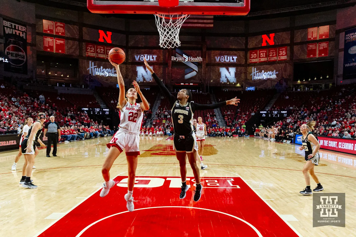 Nebraska Cornhusker forward Natalie Potts (22) makes a lay up against Purdue Boilermaker guard Jayla Smith (3) in the first half during a college basketball game on Wednesday, January 31, 2024, in Lincoln, Nebraska. Photo by John S. Peterson.