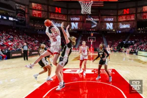 Nebraska Cornhusker guard Kendall Moriarty (15) makes a lay up against Purdue Boilermaker forward Caitlyn Harper (34) in the first half during a college basketball game on Wednesday, January 31, 2024, in Lincoln, Nebraska. Photo by John S. Peterson.