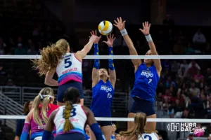Omaha Supernovas Brooke Nuneviller (5) sikes the ball against San Diego Mojo Nootsara Tomkom (13) and Ronika Stone (7) in the first period during a professional volleyball match on Saturday, February 3, 2024, in Omaha, Nebraska. Photo by John S. Peterson.