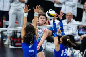 Omaha Supernovas Paige Briggs (13) spikes the ball against San Diego Mojo Ronika Stone (7) and Nootsara Tomkom (13) in the second set during a professional volleyball match on Saturday, February 3, 2024, in Omaha, Nebraska. Photo by John S. Peterson.