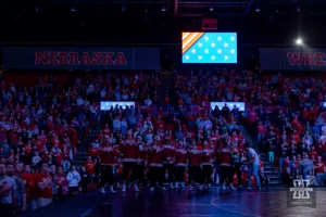 Nebraska Cornhuskers standing for the National Anthem before taking on the Michigan Wolverines during a college wrestling match on Friday, February 9, 2024, in Lincoln, Nebraska. Photo by John S. Peterson.