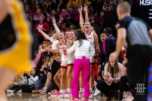 Nebraska Cornhuskers bench celebrates a three point shot by Jaz Shelley in the second quarter against the Iowa Hawkeyes during a college basketball game on Sunday, February 11, 2024, in Lincoln, Nebraska. Photo by John S. Peterson.