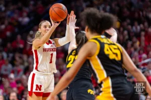 Nebraska Cornhusker guard Jaz Shelley (1) makes a three point shot against the Iowa Hawkeyes in the third quarter during a college basketball game on Sunday, February 11, 2024, in Lincoln, Nebraska. Photo by John S. Peterson.