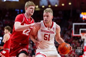 Nebraska Cornhusker forward Rienk Mast (51) drives to the basket against Wisconsin Badger forward Steven Crowl (22) in the first half during a college basketball game on Thursday, February 1, 2024, in Lincoln, Nebraska. Photo by John S. Peterson.