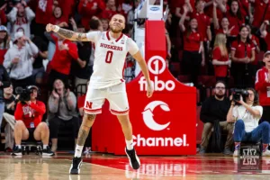 Nebraska Cornhusker guard C.J. Wilcher (0) celebrates making a three point shot against the Wisconsin Badgers in the second half during a college basketball game on Thursday, February 1, 2024, in Lincoln, Nebraska. Photo by John S. Peterson.