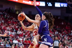 Nebraska Cornhusker forward Natalie Potts (22) makes a lay up against Northwestern Wildcat forward Caileigh Walsh (10) in the first quarter during a college basketball game Tuesday, February 20, 2024, in Lincoln, Neb. Photo by John S. Peterson.