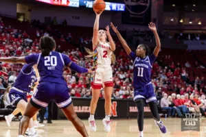 Nebraska Cornhusker guard Logan Nissley (2) makes a jump shot against Northwestern Wildcat guard Hailey Weaver (11) in the second quarter during a college basketball game Tuesday, February 20, 2024, in Lincoln, Neb. Photo by John S. Peterson.