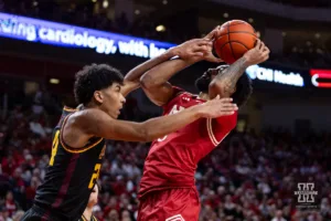 Nebraska Cornhusker guard Brice Williams (3) fouled by Minnesota Golden Gopher guard Cam Christie (24) in the first half during a college basketball game Sunday, February 25, 2024, in Lincoln, Neb. Photo by John S. Peterson.