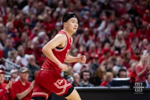 Nebraska Cornhusker guard Keisei Tominaga (30) runs back down the court against after making a lay up against the Minnesota Golden Gophers during a college basketball game Sunday, February 25, 2024, in Lincoln, Neb. Photo by John S. Peterson.
