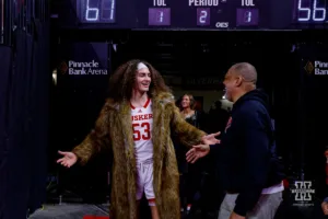 Nebraska Cornhusker forward Josiah Allick (53) sporting a faux fur coat after the win over the Rutgers Scarlet Knights during a college basketball game Sunday, March 3, 2024, in Lincoln, Neb. Photo by John S. Peterson.