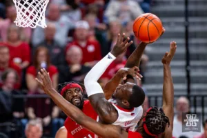Nebraska Cornhusker forward Juwan Gary (4) is fouled by Rutgers Scarlet Knight center Clifford Omoruyi (11) in the first half during a college basketball game Sunday, March 3, 2024, in Lincoln, Neb. Photo by John S. Peterson.
