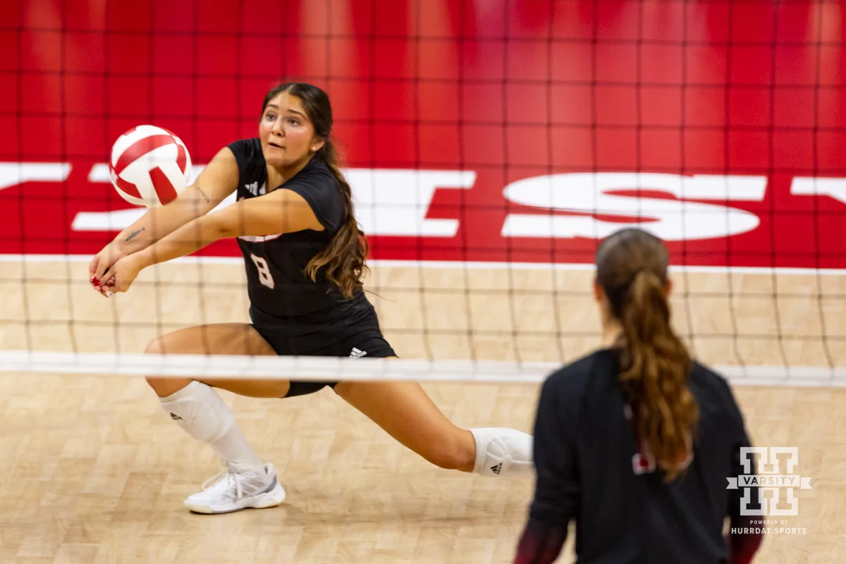 Nebraska Cornhusker Lexi Rodriguez (8) digs the ball against the Stanford Cardinal in the second set during a college volleyball match Wednesday, September 18, 2024, in Lincoln, Nebraska. Photo by John S. Peterson.