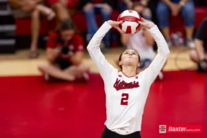 Nebraska Cornhusker Bergen Reilly (2) sets the ball against the Arizona State Sundevils in the third set during the college volleyball match Friday, September 13, 2024, in Lincoln, Nebraska. Photo John S. Peterson.