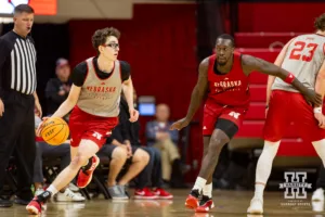 Nebraska Cornhusker Gavin Griffiths (gray) dribbles the ball against Juwan Gary (red) during a scrimmage Sunday, October 13, 2024, in Lincoln, Nebraska. Photo by John S. Peterson.