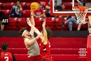 Nebraska Cornhusker Andrew Morgan (23) puts up a short jumper against Braxton Meah during a scrimmage Sunday, October 13, 2024, in Lincoln, Nebraska. Photo by John S. Peterson.