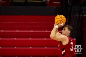 Nebraska Cornhusker Cale Jacobsen takes a three point shot during a scrimmage Sunday, October 13, 2024, in Lincoln, Nebraska. Photo by John S. Peterson.