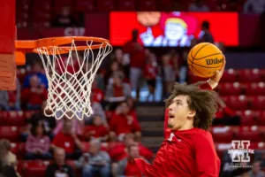 Nebraska Cornhusker Braxton Meah (34) dunks the ball warming up during a scrimmage Sunday, October 13, 2024, in Lincoln, Nebraska. Photo by John S. Peterson.