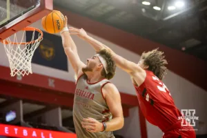 Nebraska Cornhusker Andrew Morgan (23) goes for a lay up against Braxton Meah during a scrimmage Sunday, October 13, 2024, in Lincoln, Nebraska. Photo by John S. Peterson.