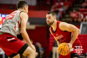 Nebraska Cornhusker Rollie Worster (red) looks to drive to the basket against Nick Janowski during a scrimmage Sunday, October 13, 2024, in Lincoln, Nebraska. Photo by John S. Peterson.