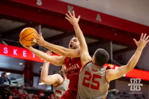 Nebraska Cornhusker Rollie Worster (red) goes for a lay up against Nick Janowski during a scrimmage Sunday, October 13, 2024, in Lincoln, Nebraska. Photo by John S. Peterson.