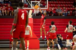 Nebraska Cornhusker Brice Williams (3) makes a dunk during a scrimmage Sunday, October 13, 2024, in Lincoln, Nebraska. Photo by John S. Peterson.