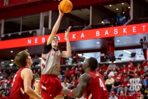 Nebraska Cornhusker Gavin Griffiths (12) puts up a lay up against Juwan Gary during a scrimmage Sunday, October 13, 2024, in Lincoln, Nebraska. Photo by John S. Peterson.