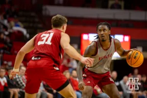 Nebraska Cornhusker Ahron Ulis (gray) dribbles the ball against Cale Jacobsen during a scrimmage Sunday, October 13, 2024, in Lincoln, Nebraska. Photo by John S. Peterson.