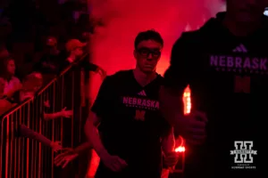 Nebraska Cornhusker Gavin Griffiths (12) running out to the court to take on Grand Valley State Lakers during a college men’s basketball game Thursday, October 27, 2024, in Lincoln, Nebraska. Photo by John S. Peterson.