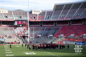 Nebraska Cornhuskers meet at center field after arriving at Ohio Stadium during a college football game Saturday, October 26, 2024,in Columbus, Ohio. Photo by John S. Peterson.