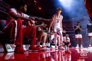 Nebraska Cornhusker Connor Essegian (0) gives fives after being introduced before a college men’s basketball game against the Grand Valley State Lakers Thursday, October 27, 2024, in Lincoln, Nebraska. Photo by John S. Peterson.